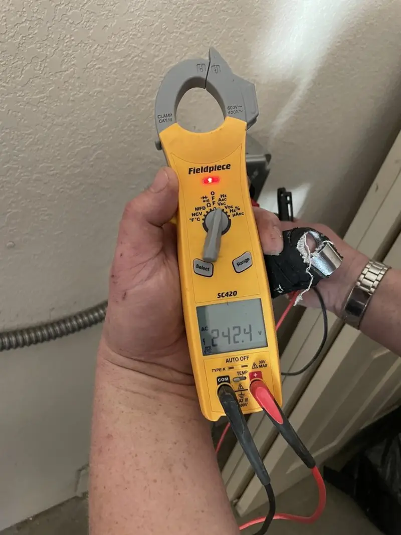 Voltage testing with clamp meter during Electrical Installation Services in North Wildwood